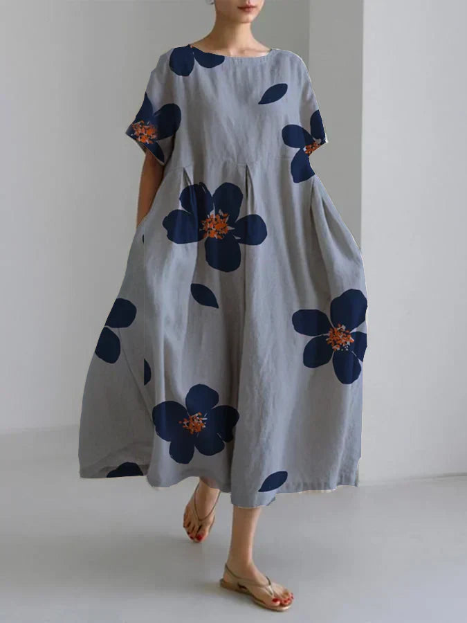 Livia | Luchtige bloemenjurk met chique accenten – ideaal voor zomerse flair.