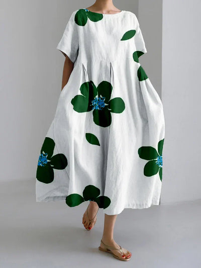 Jasmijn | Luchtige bloemenjurk met chique accenten – ideaal voor zomerse flair.