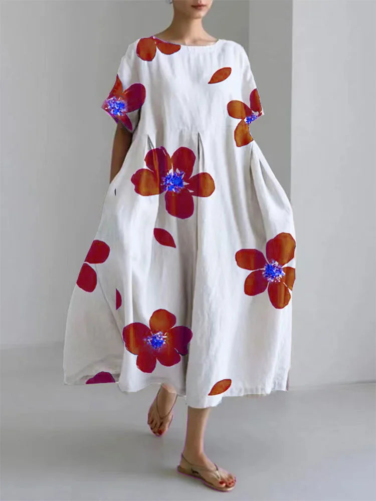 Jasmijn | Luchtige bloemenjurk met chique accenten – ideaal voor zomerse flair.